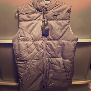Men’s reversible Nike Puffer. New